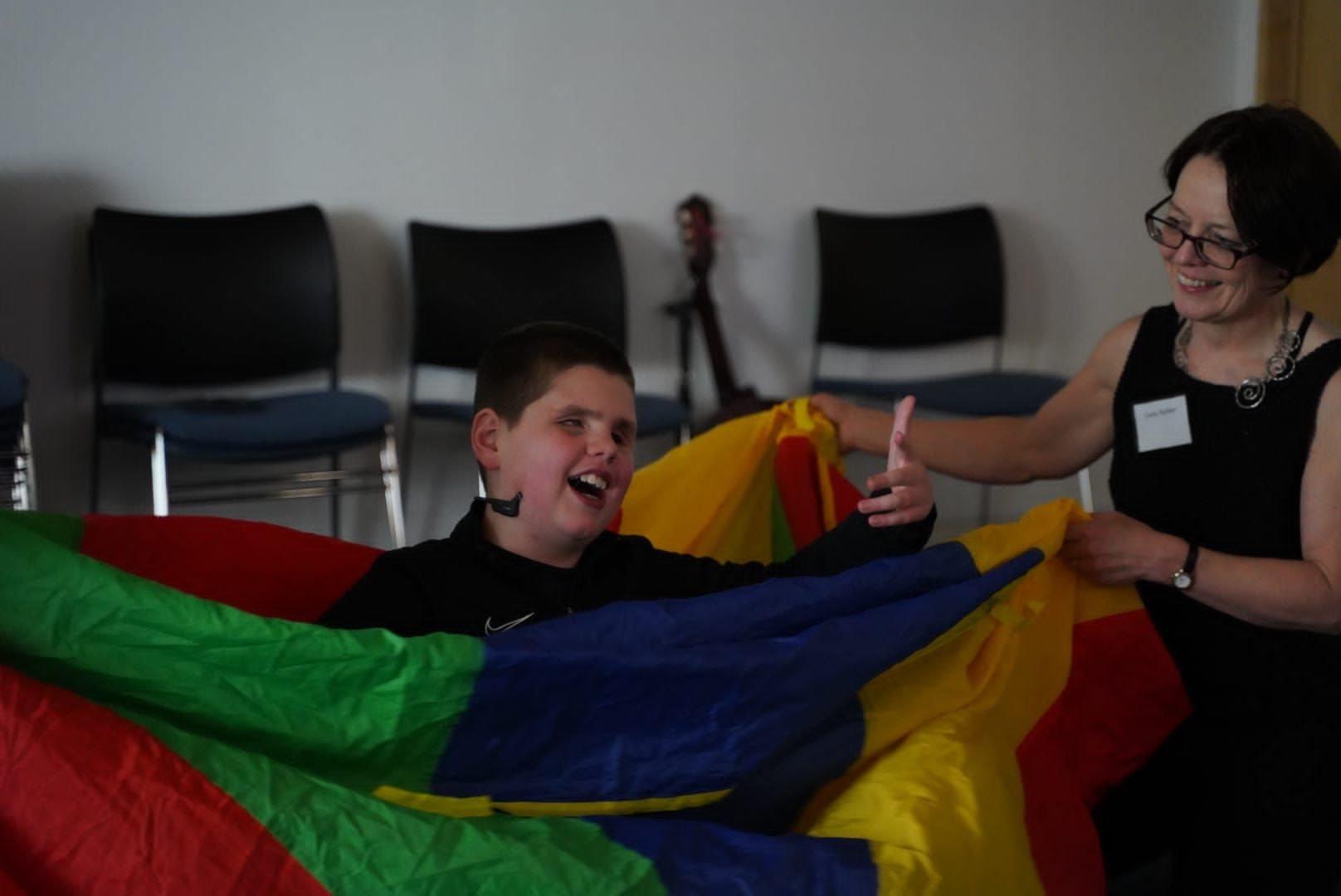 Guests enjoying the sensory parachute activities