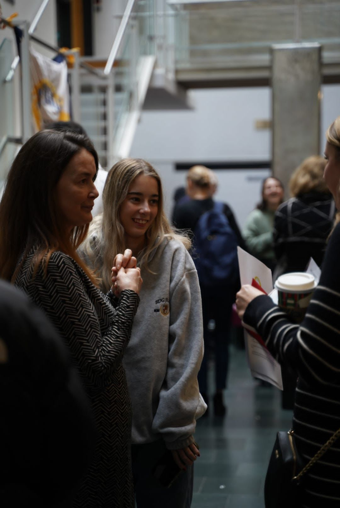 Guests mingling in the foyer