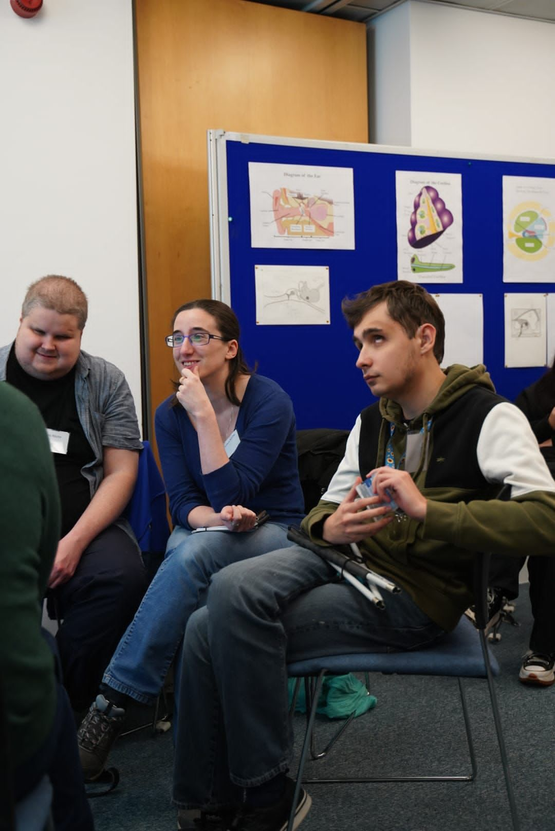 Guests taking part in a introduction to Norrie disease research session