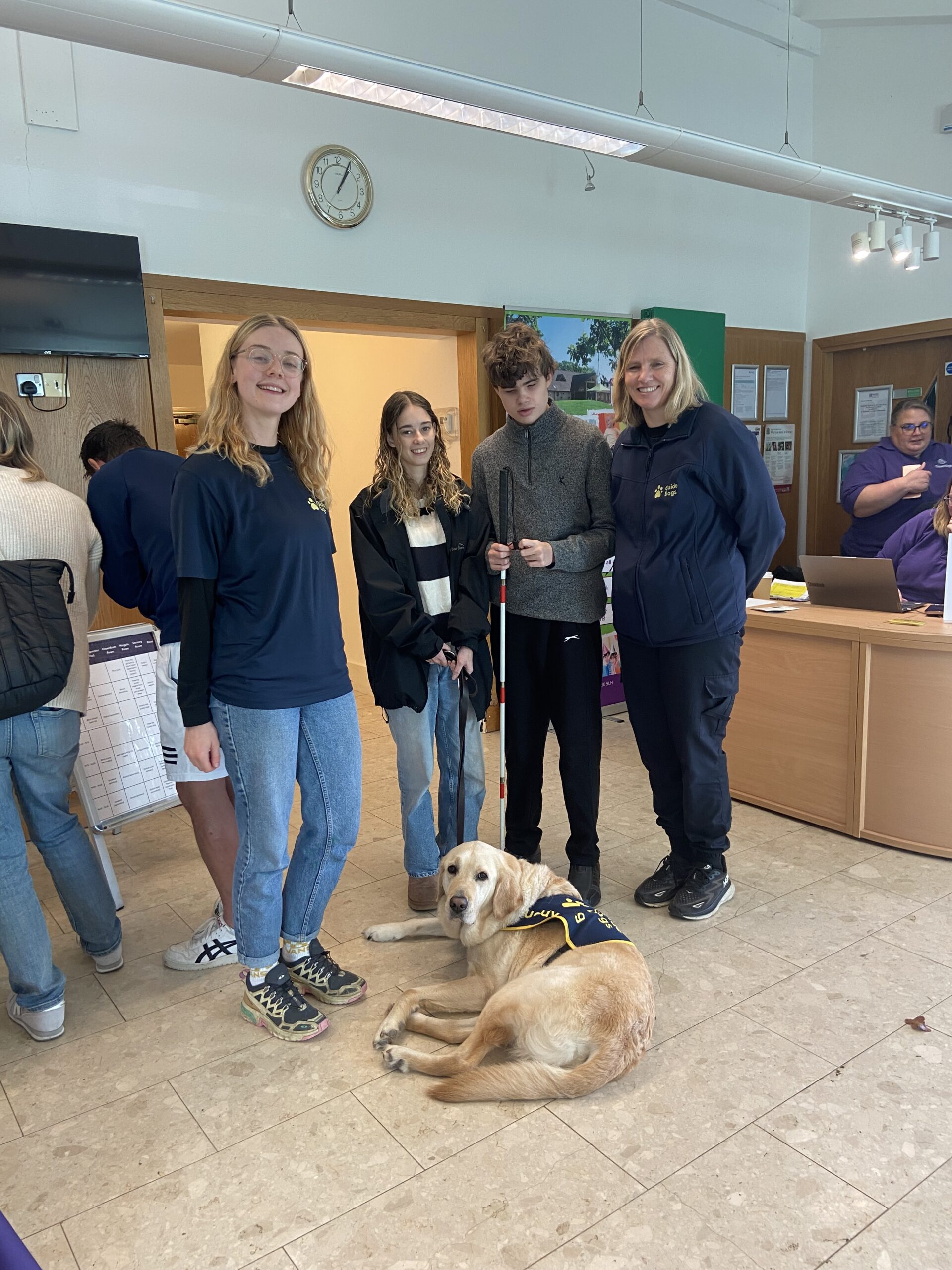 Webb with Josh, Chloe and the Buddy Dogs team