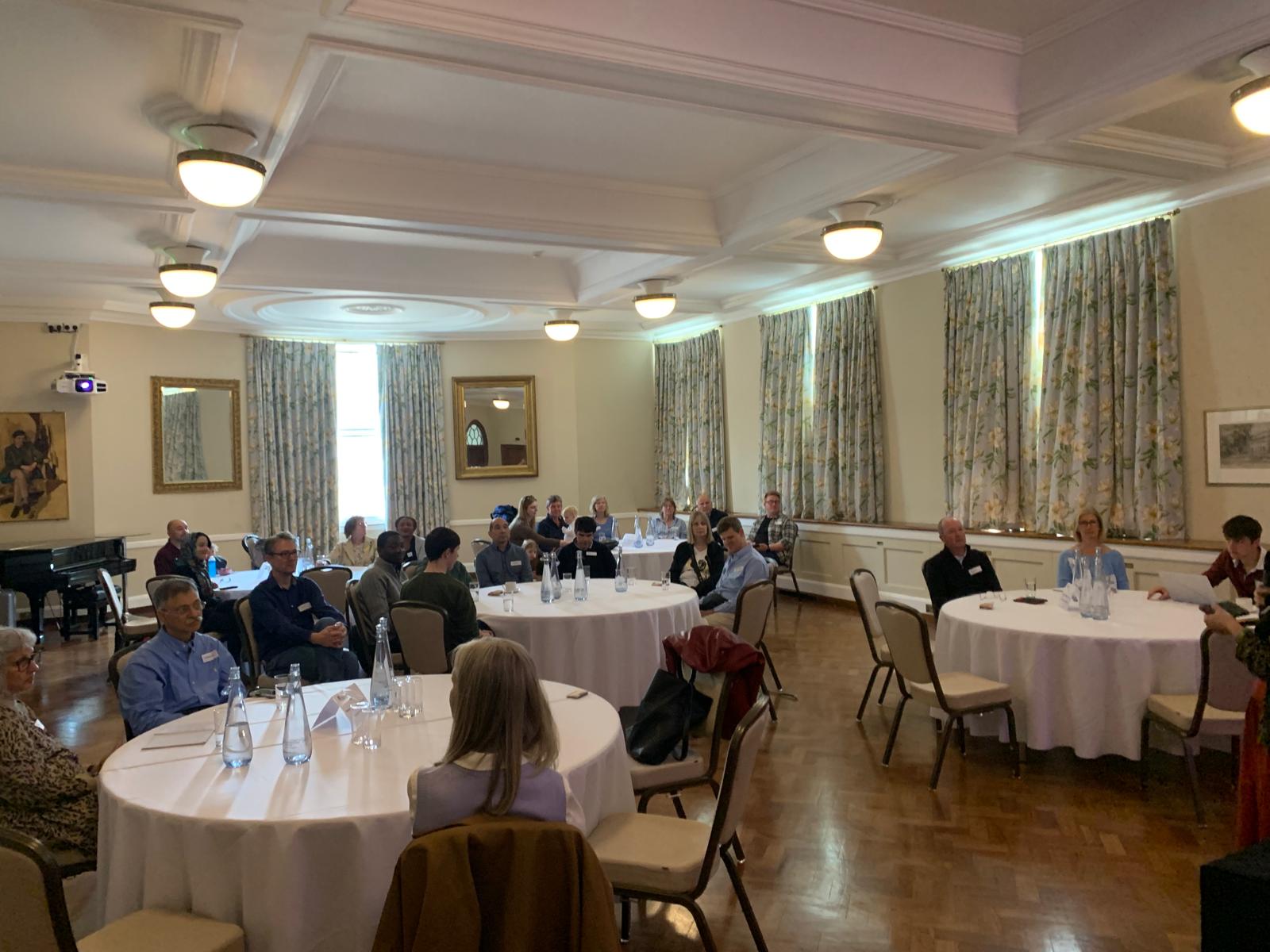 Anthony and guests in conference room