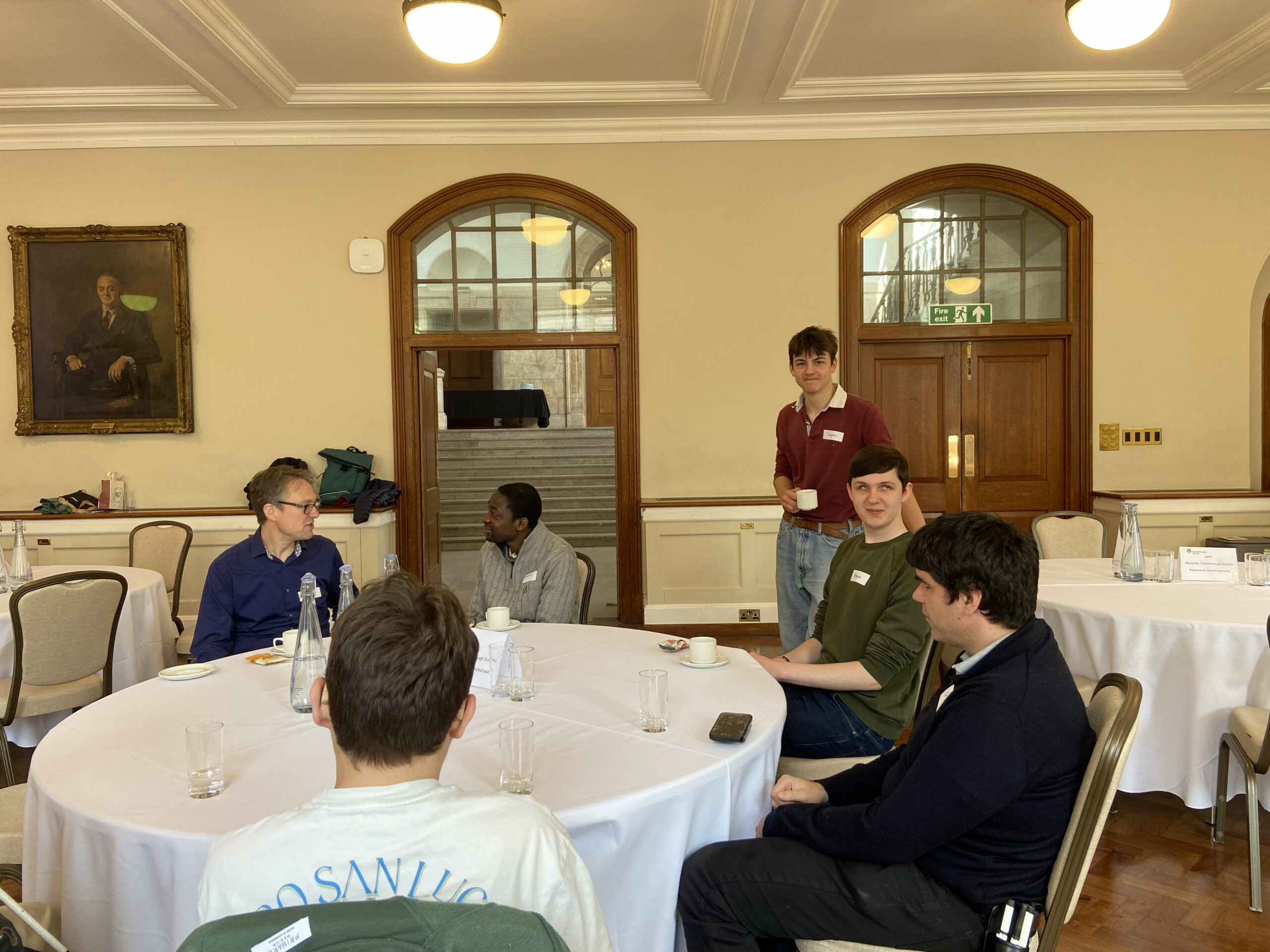 Neil, Ed, Emmanual, Ethan, Jasper in the conference hall